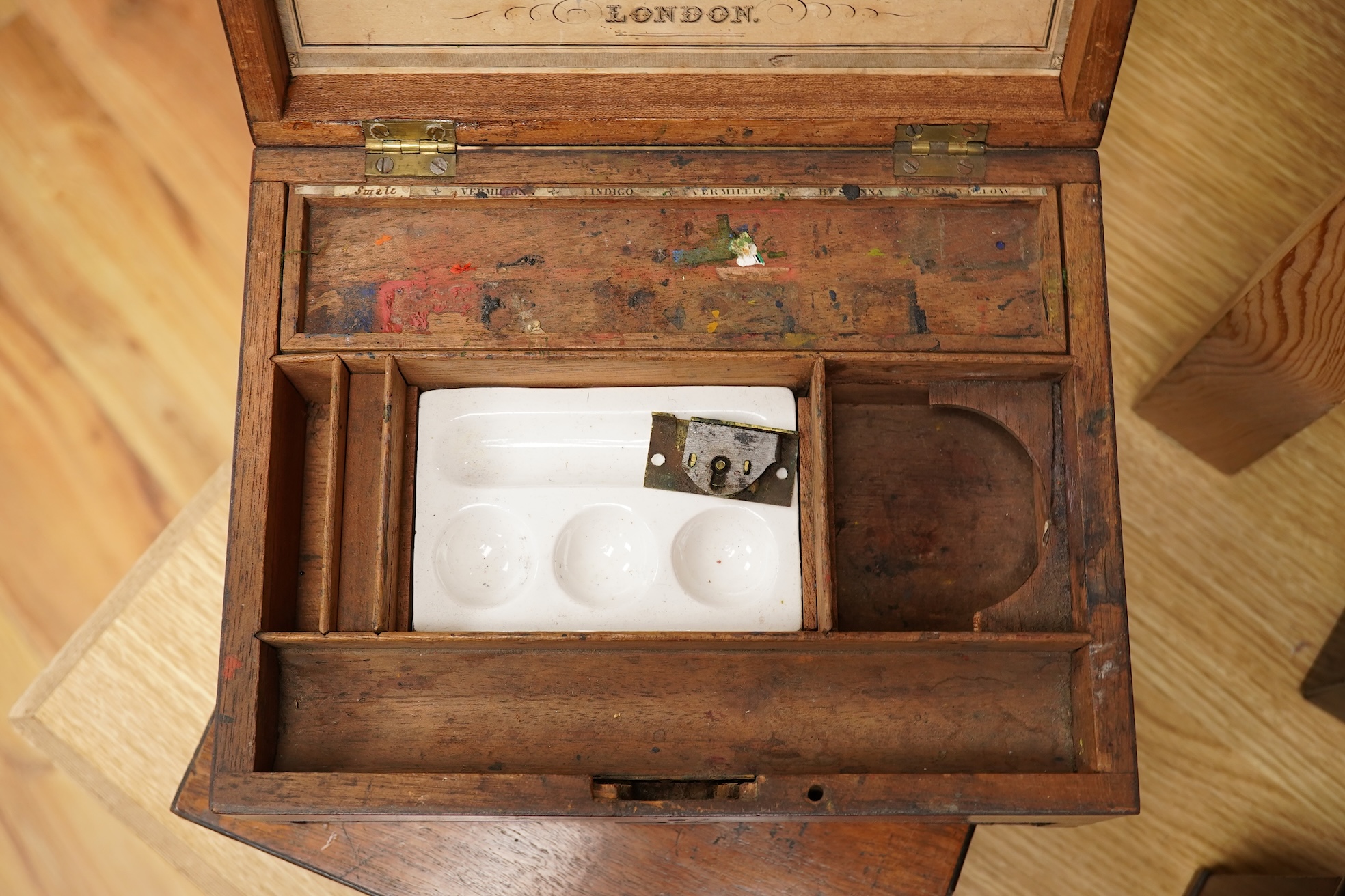 A group of five 19th-century boxes to include two artists paint boxes and a post box, largest 30cm wide